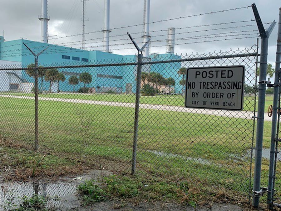 Power plant site as it looks now through fence